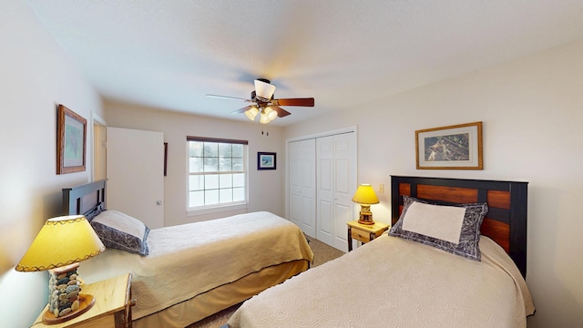 bedroom featuring a closet, carpet, and a ceiling fan