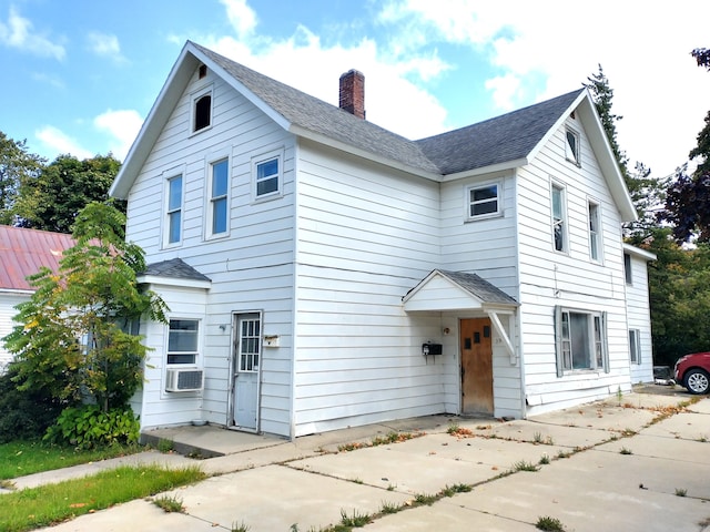 view of front of house with cooling unit