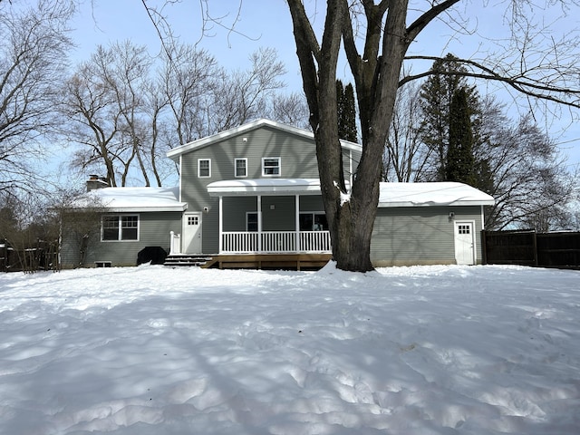 view of front property featuring covered porch