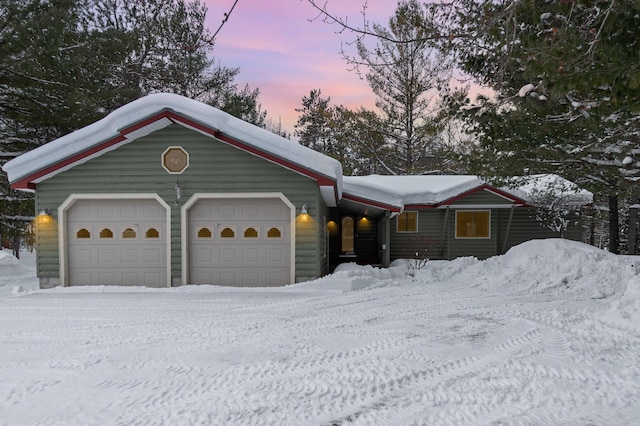 rustic home with an attached garage