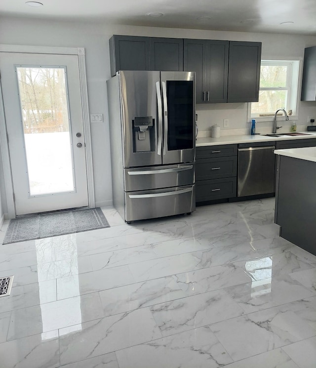 kitchen featuring sink and stainless steel appliances