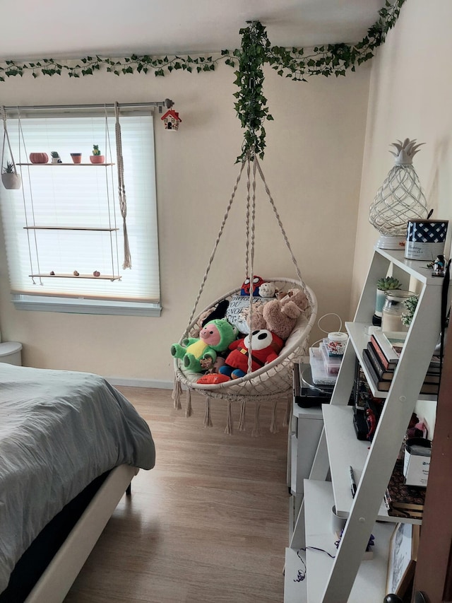 bedroom featuring hardwood / wood-style floors