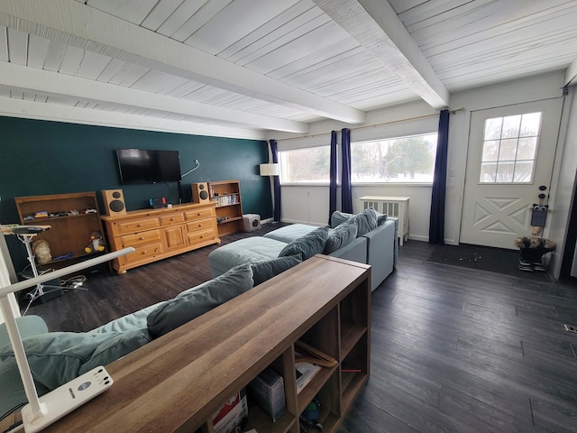 living room featuring beamed ceiling, dark hardwood / wood-style flooring, and wooden ceiling