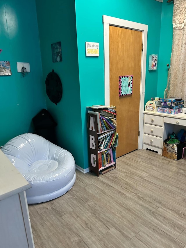 bedroom featuring wood finished floors