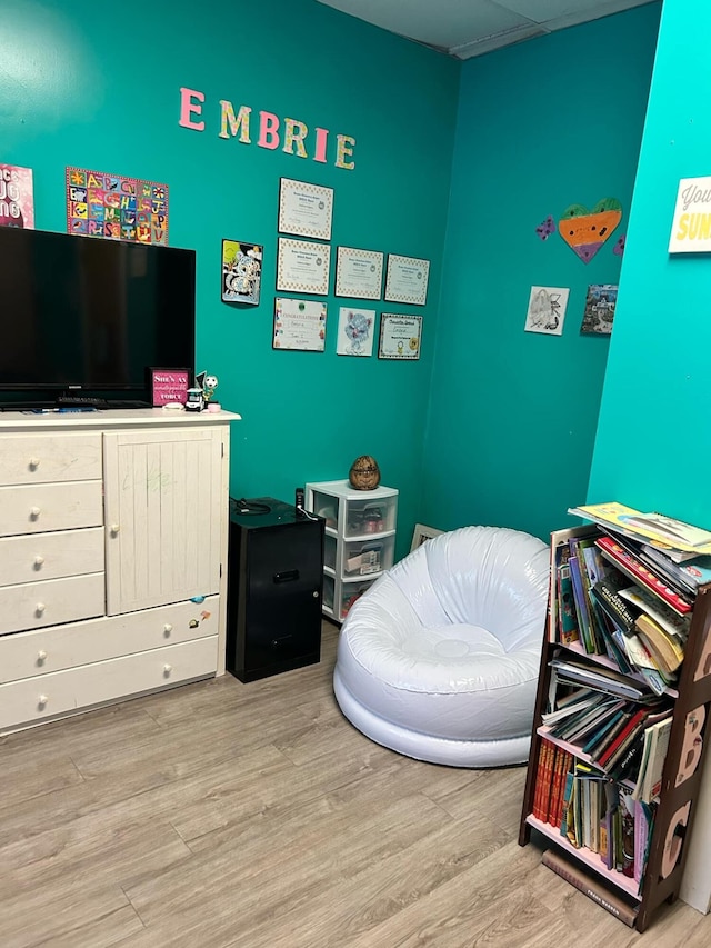 bedroom with wood finished floors