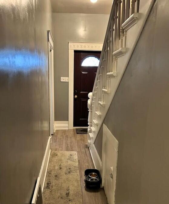 bedroom featuring wood finished floors