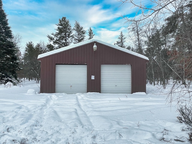 view of snow covered garage