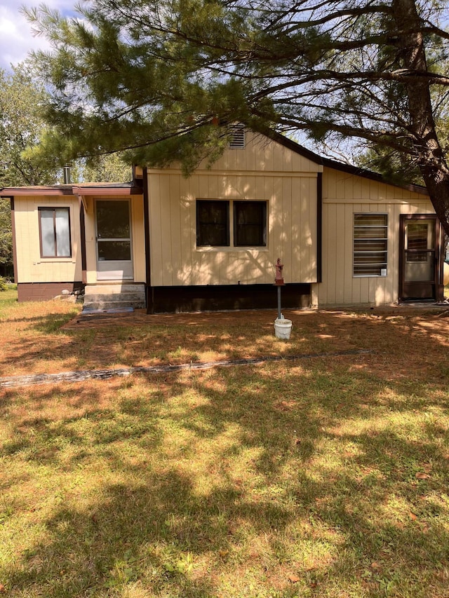 exterior space with a front yard