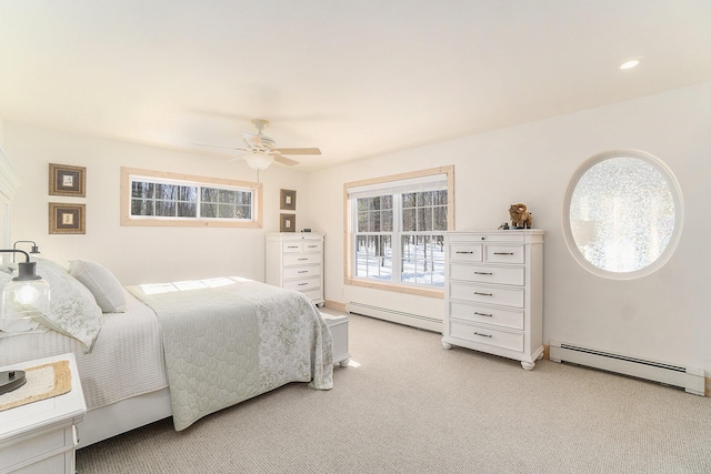 bedroom with recessed lighting, a baseboard radiator, ceiling fan, and light colored carpet