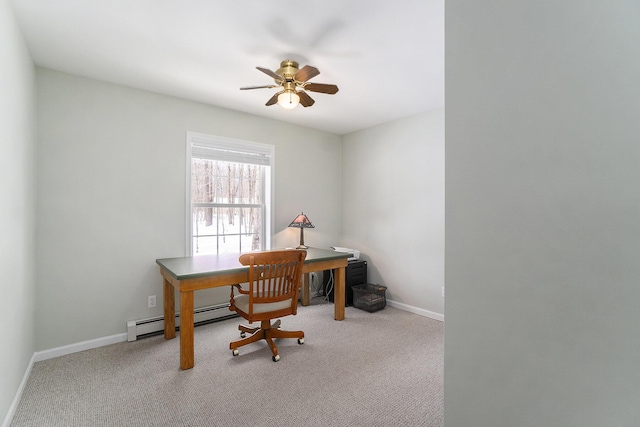 office with a ceiling fan, baseboards, light carpet, and baseboard heating