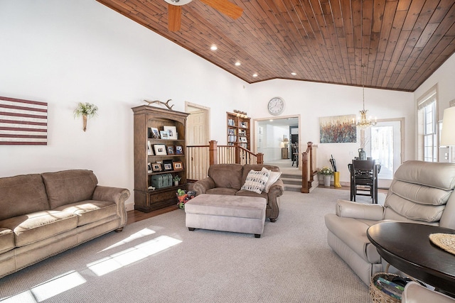 living area featuring light carpet, high vaulted ceiling, wood ceiling, and a notable chandelier