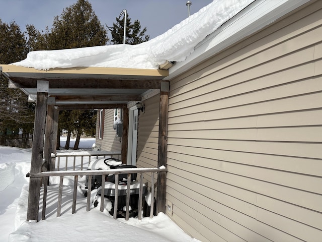 view of snow covered deck