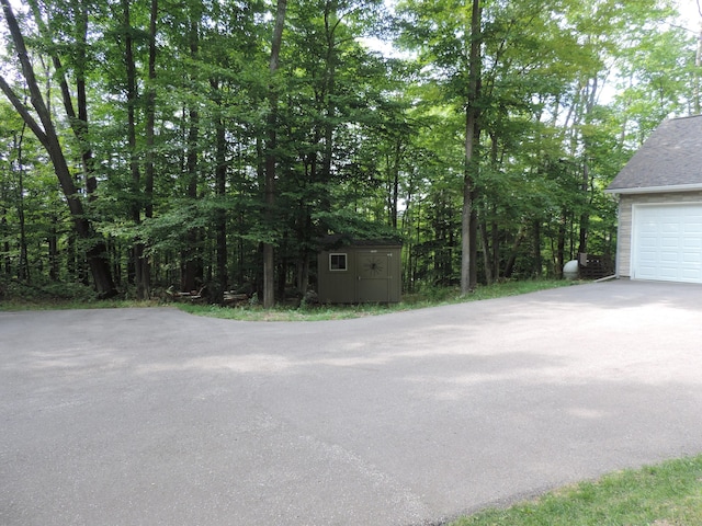 garage featuring driveway