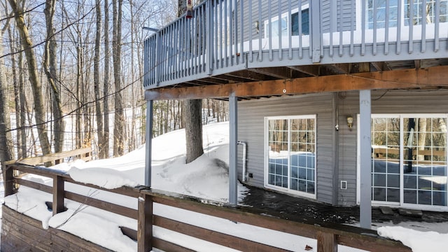 view of snow covered deck