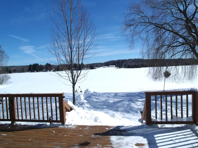 view of snow covered deck