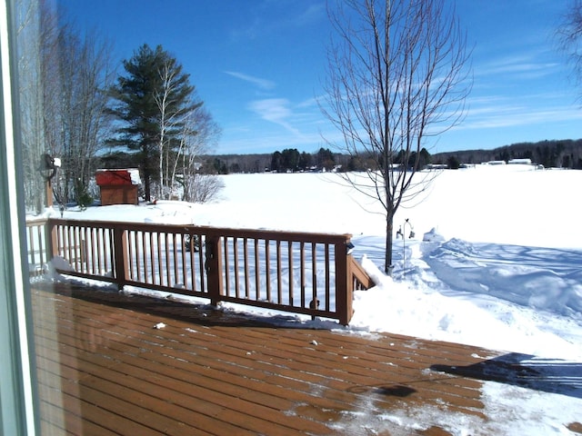 view of snow covered deck