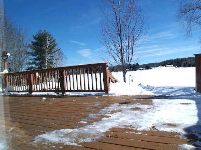 view of snow covered deck