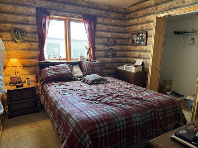 bedroom with light carpet and log walls