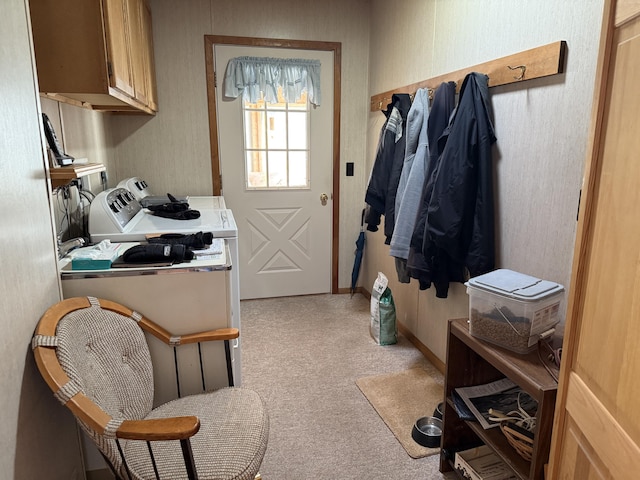 interior space with washing machine and dryer and baseboards