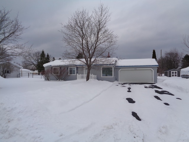 single story home featuring an attached garage