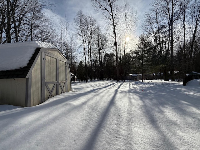 view of yard covered in snow