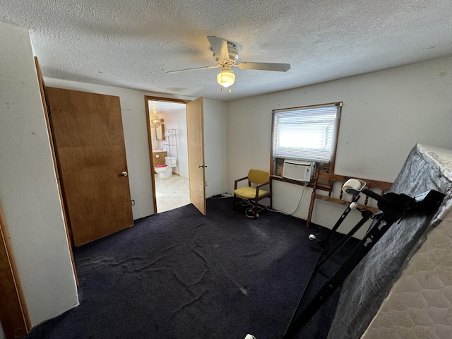 interior space featuring a textured ceiling, carpet, cooling unit, and a ceiling fan