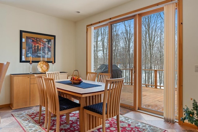 dining space with baseboards