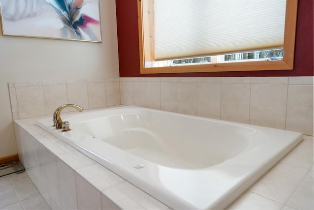 bathroom featuring a bath and tile patterned floors