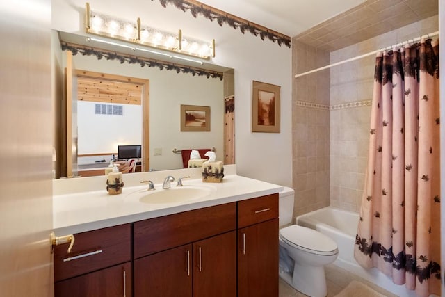 full bath featuring toilet, shower / bath combo, visible vents, and vanity