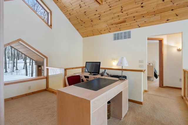 office space featuring light carpet, baseboards, visible vents, wooden ceiling, and high vaulted ceiling