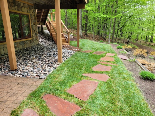 view of yard featuring stairs