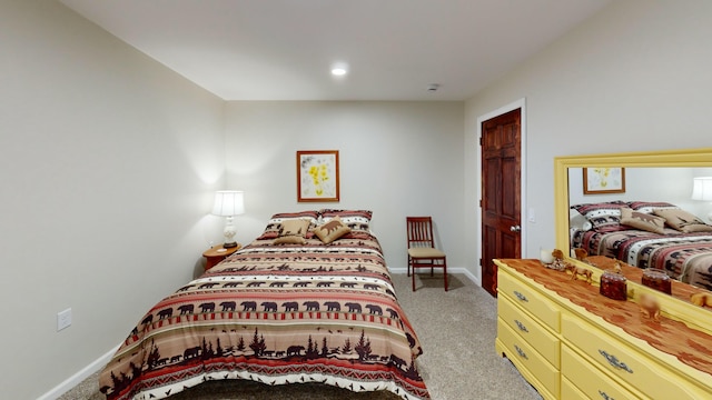 bedroom featuring recessed lighting, carpet flooring, and baseboards