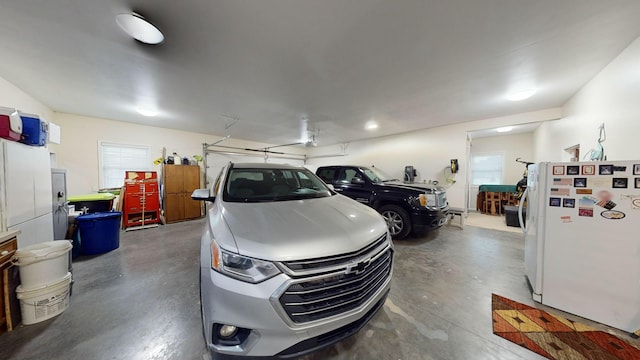 garage with freestanding refrigerator