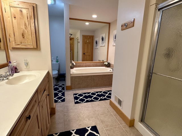 full bath featuring a garden tub, toilet, tile patterned flooring, visible vents, and a shower stall