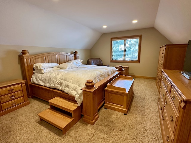 bedroom with vaulted ceiling, recessed lighting, baseboards, and light colored carpet