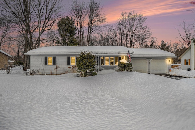 single story home with a garage