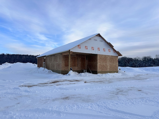 view of snow covered property