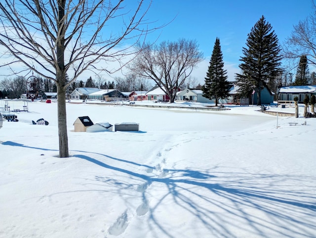 view of yard covered in snow