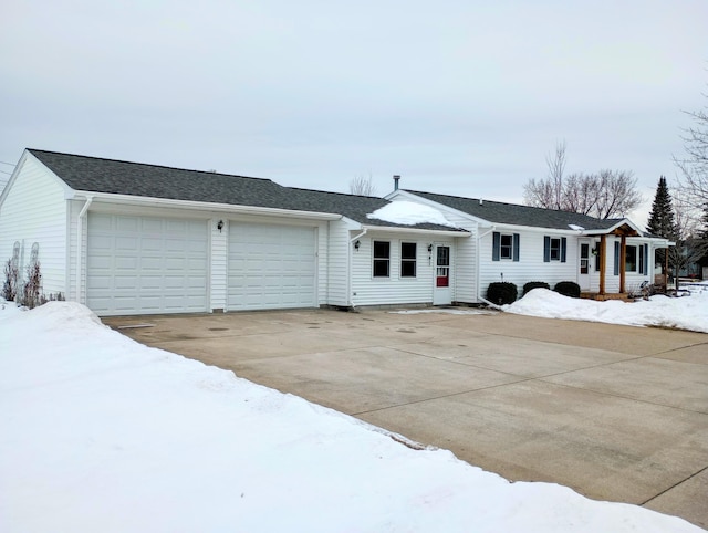 ranch-style home with a garage