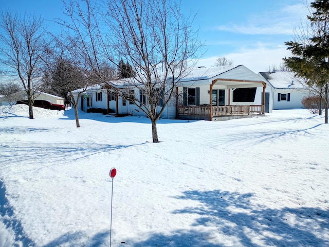 ranch-style home with covered porch