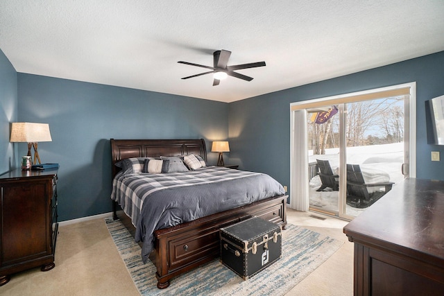 bedroom featuring light carpet, access to outside, baseboards, and ceiling fan