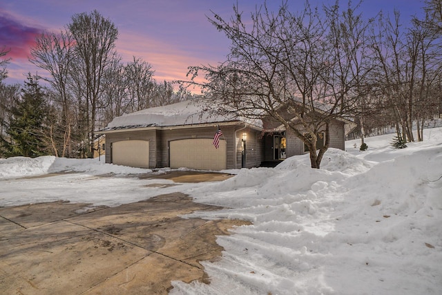 view of front facade with an attached garage