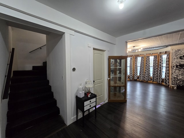 stairway with wood finished floors