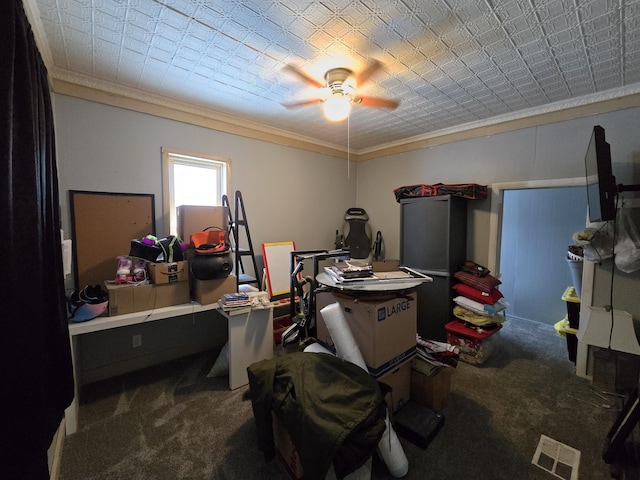 interior space featuring an ornate ceiling, a ceiling fan, carpet, and ornamental molding