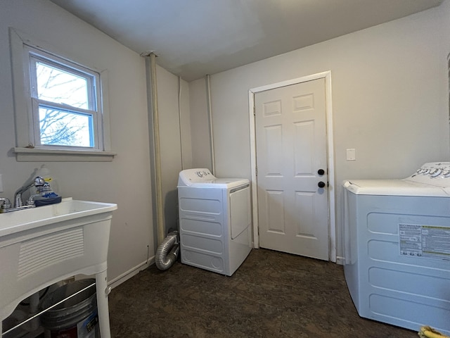 laundry room with washer and dryer and laundry area