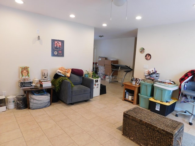 living room featuring recessed lighting and light tile patterned floors