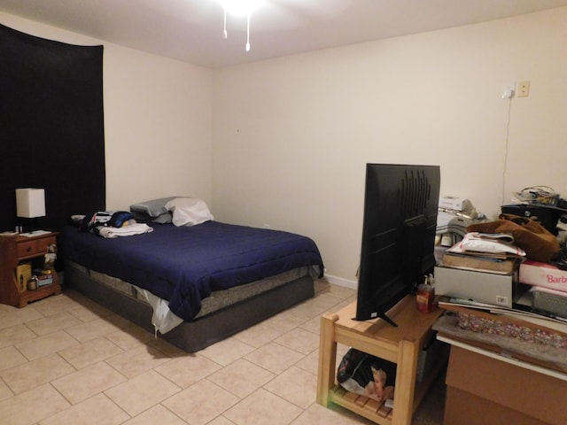 bedroom featuring light tile patterned floors