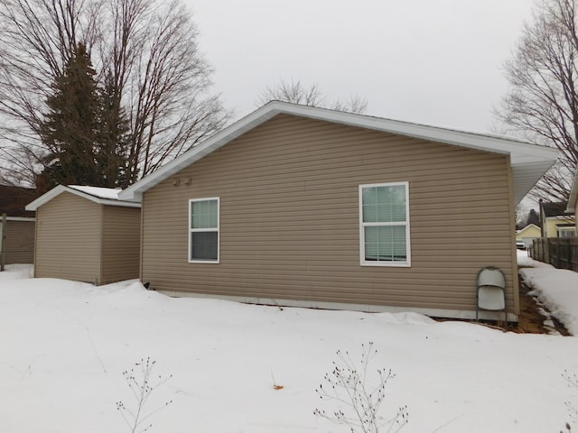 view of snow covered property