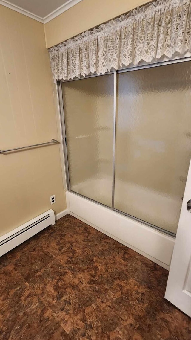 full bathroom featuring a baseboard radiator, enclosed tub / shower combo, and crown molding