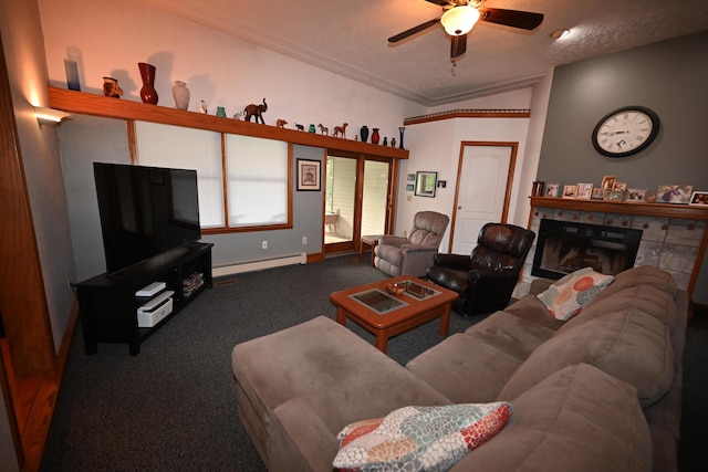 living area with ceiling fan, carpet floors, a fireplace, vaulted ceiling, and baseboard heating